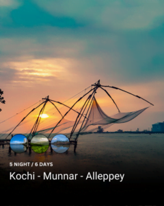 Sunset at Fort Kochi Beach, Kerala, seen through a Chinese fishing net.